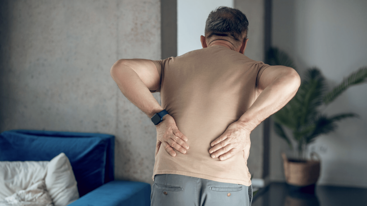 Back pain in the lumbar region in a man. 